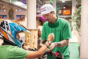 Boy with helmet in the Trail Park in family sport hotel STOCK resort Austria