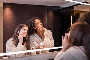 Ladies using STOCK Diamond products in the 5 star wellness hotel Austria STOCK resort