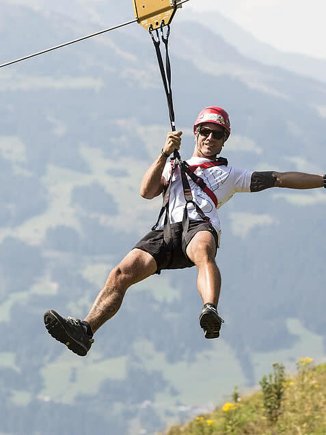 Eine Person auf dem Almflieger Gerlosstein