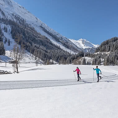 Couple skiing in Austria