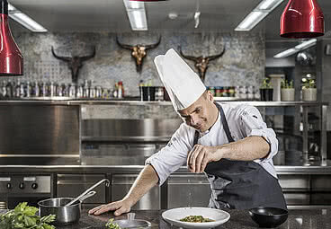 Chef in gourmet hotel STOCK resort in Austria