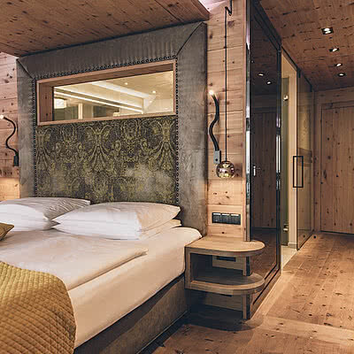 Bett im Komfortdoppelzimmer Sonnblick im STOCK resort