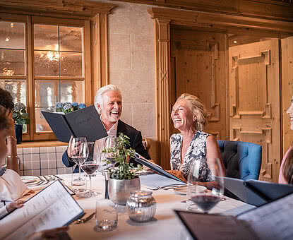 Family in the restaurant in a gourmet hotel Austria STOCK resort