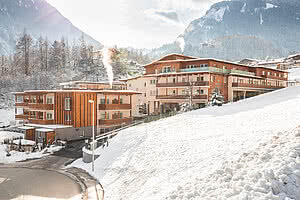 Außenansicht Winter der Team Lodge STOCK resort