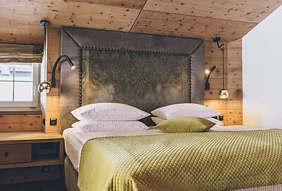 Bett im Komfortdoppelzimmer Sonnblick im STOCK resort