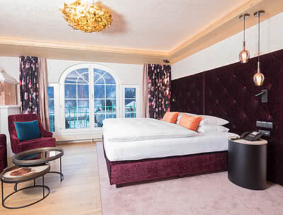 Bett in der Kaisersuite Sissi im STOCK resort