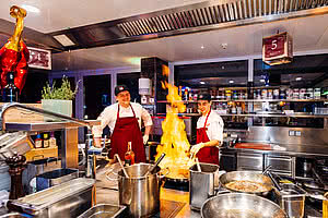 Chefs at Kitchenparty in gourmet hotel STOCK resort in Austria